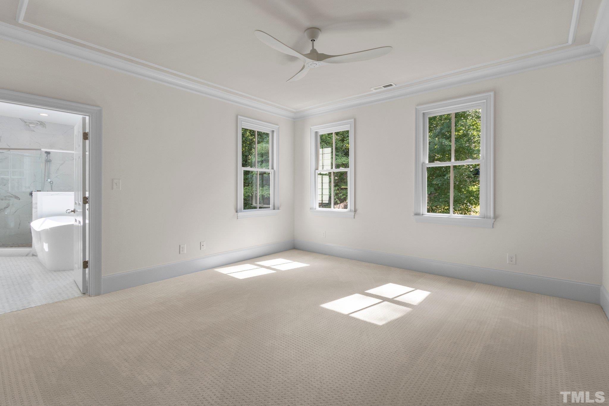1500 Banbury Road Raleigh, NC 27607 - Photo 18 of 39 a view of an empty room with a window