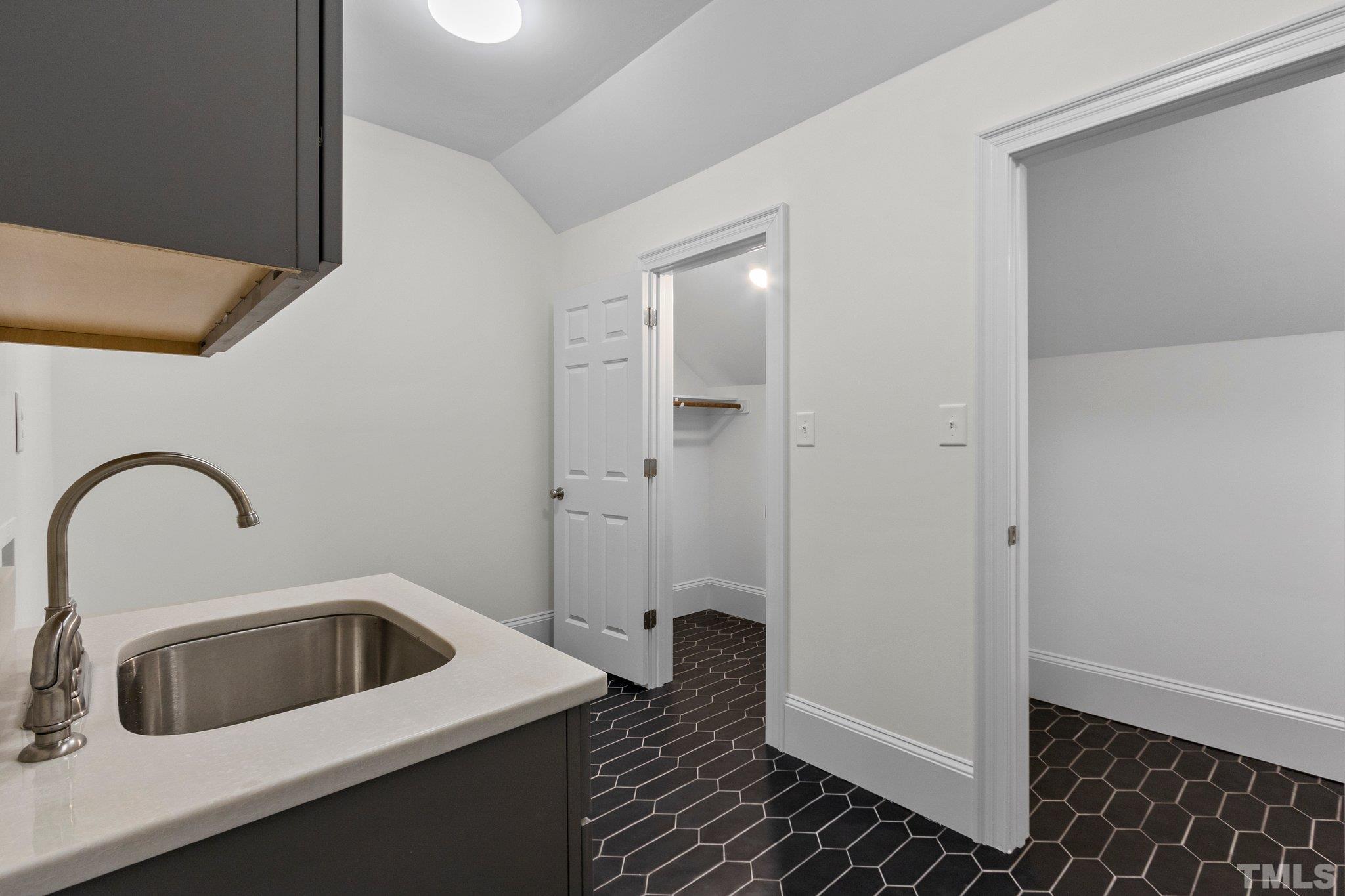 1500 Banbury Road Raleigh, NC 27607 - Photo 22 of 39 a close view of a sink and utility room