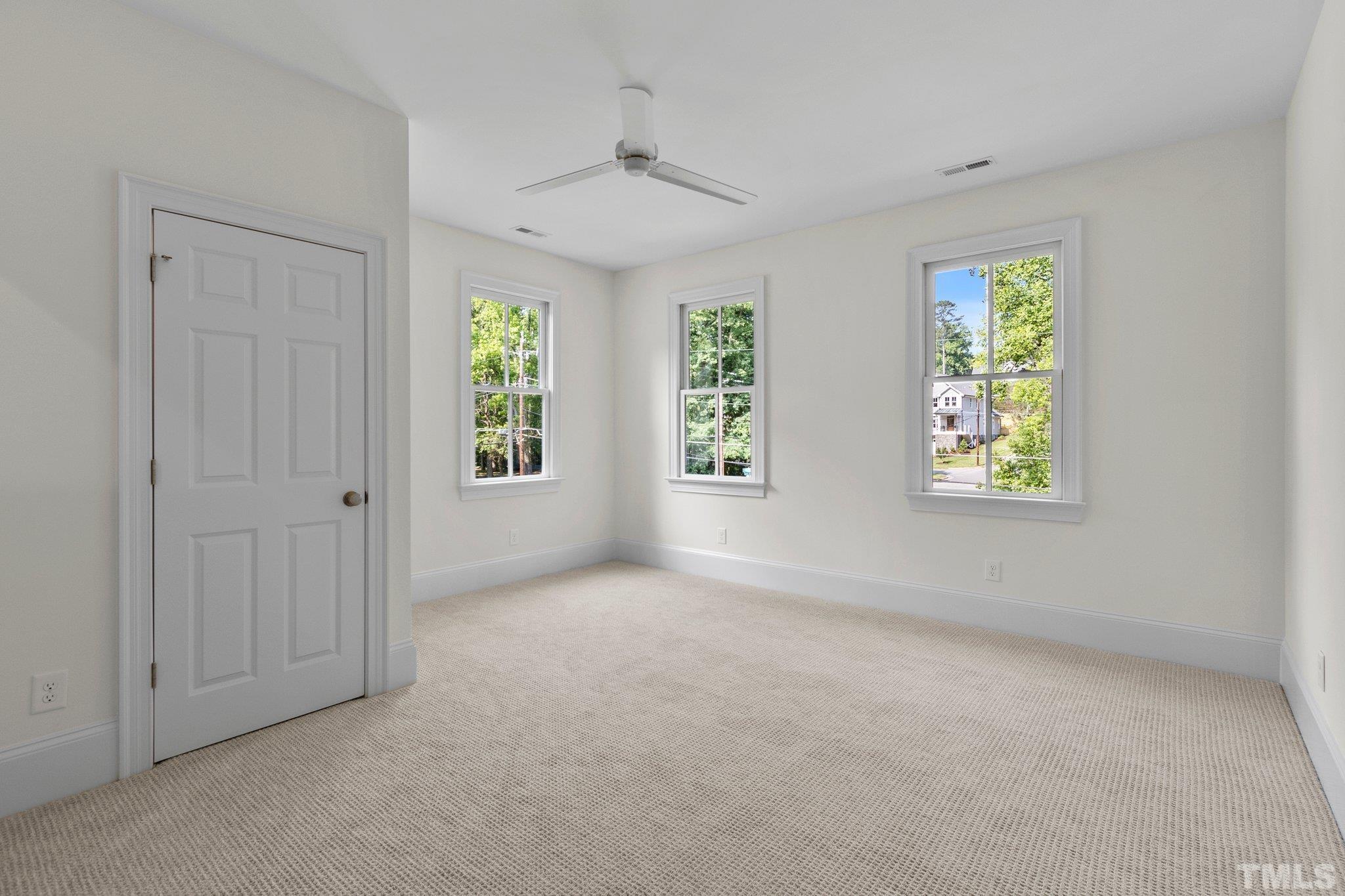 1500 Banbury Road Raleigh, NC 27607 - Photo 29 of 39 an empty room with windows