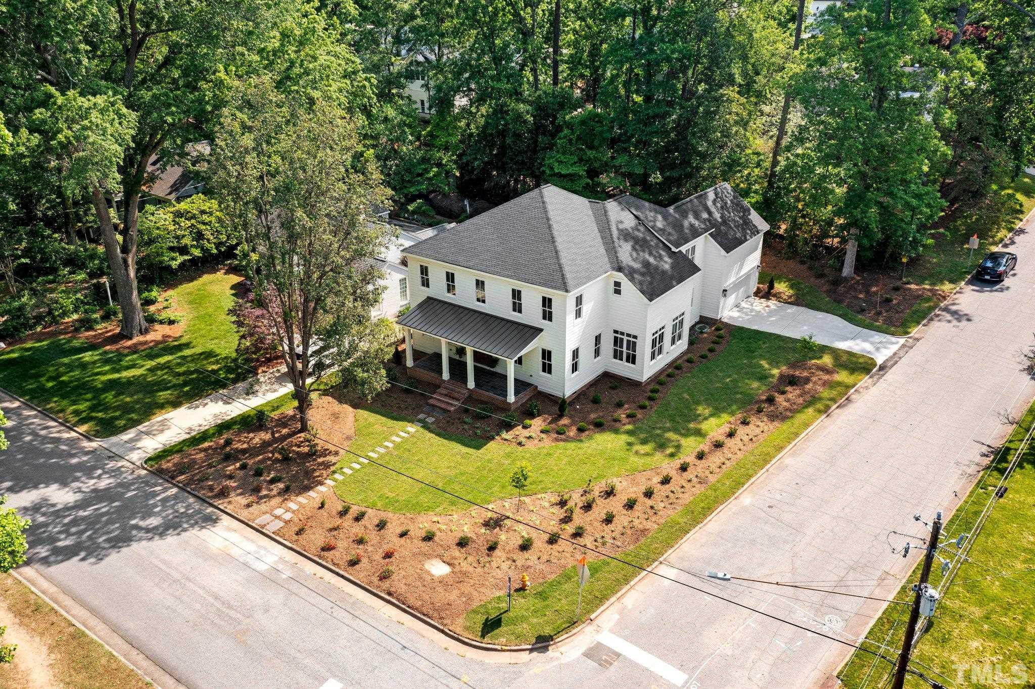 1500 Banbury Road Raleigh, NC 27607 - Photo 35 of 39 a view of a house with a yard