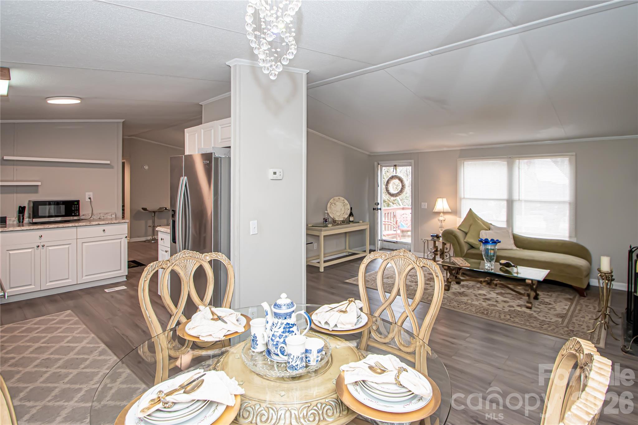 2345 Kingsburry Road York, SC 29745 - Photo 15 of 43 a living room with furniture and a chandelier