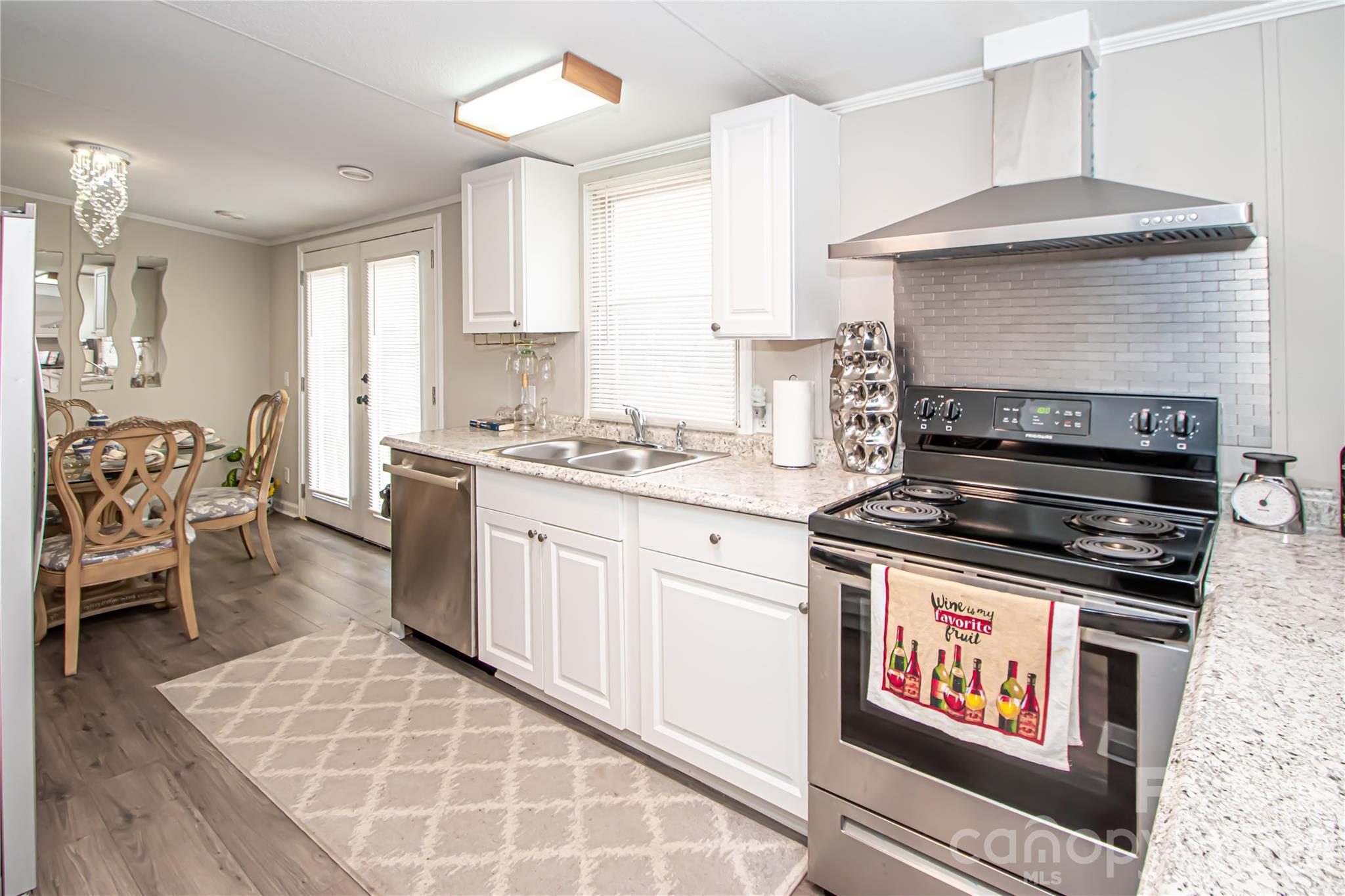 2345 Kingsburry Road York, SC 29745 - Photo 17 of 43 a kitchen with stainless steel appliances granite countertop a stove a sink and a microwave