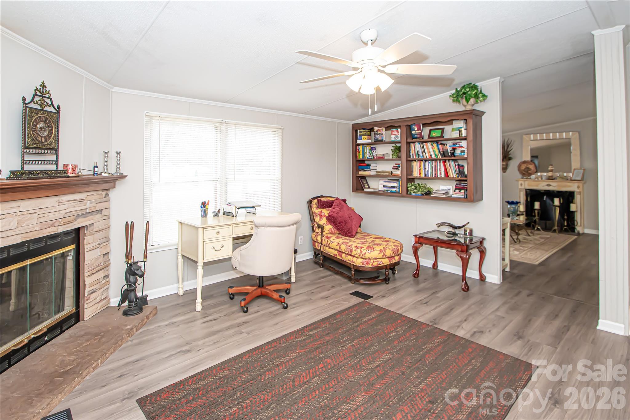 2345 Kingsburry Road York, SC 29745 - Photo 22 of 43 a living room with furniture a fireplace and a table