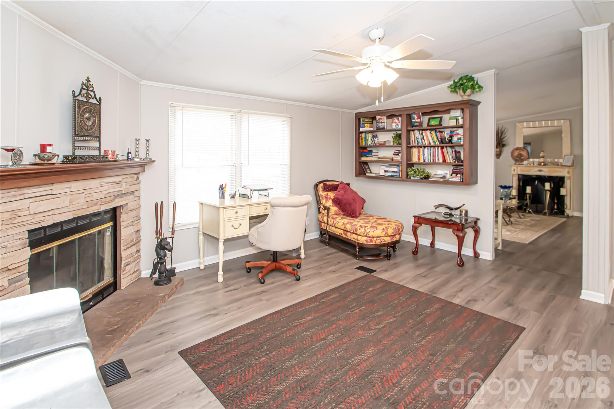 2345 Kingsburry Road York, SC 29745 - Photo 23 of 43 a living room with furniture a fireplace and a window