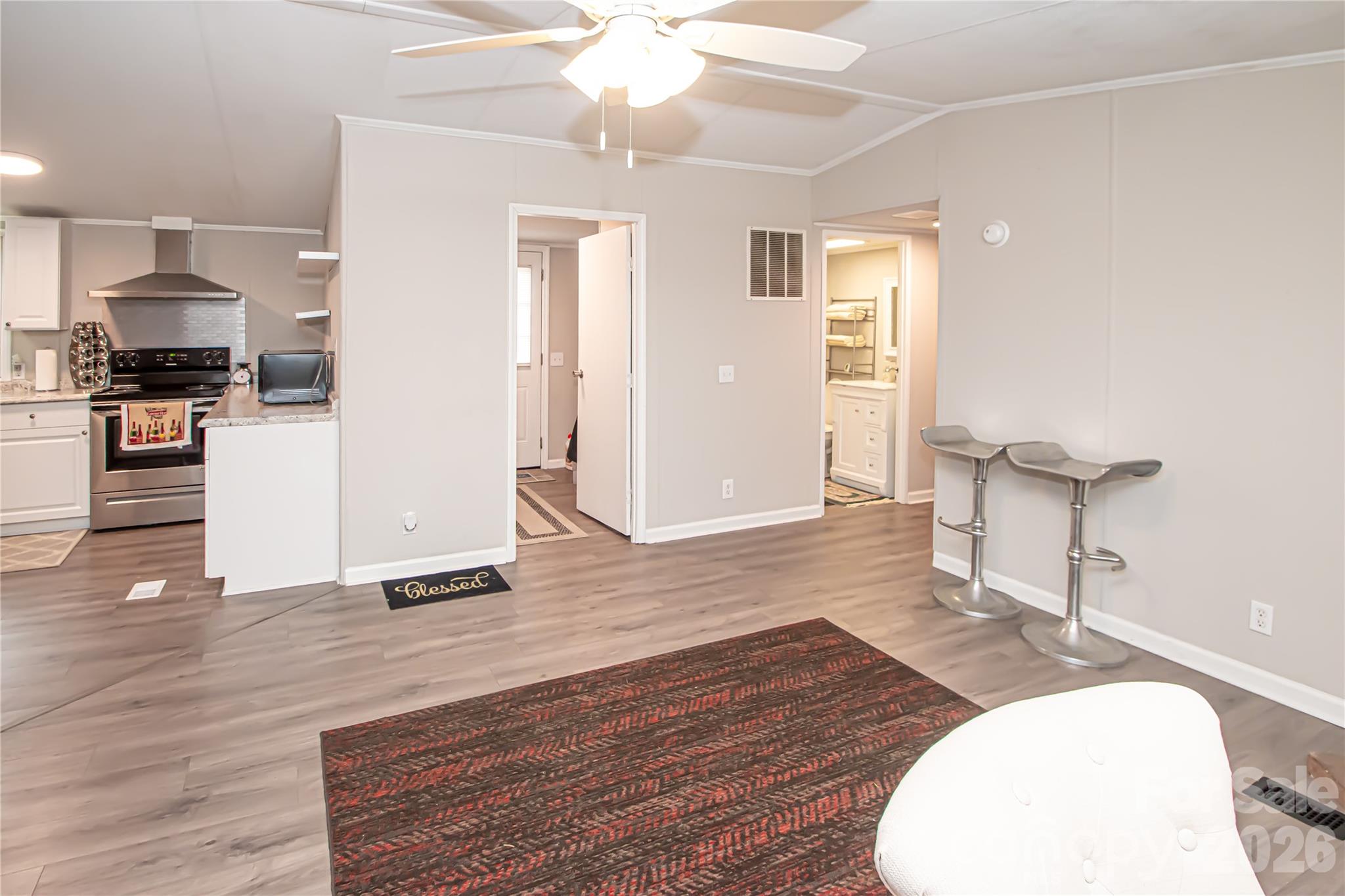 2345 Kingsburry Road York, SC 29745 - Photo 25 of 43 a living room with wooden floor and furniture