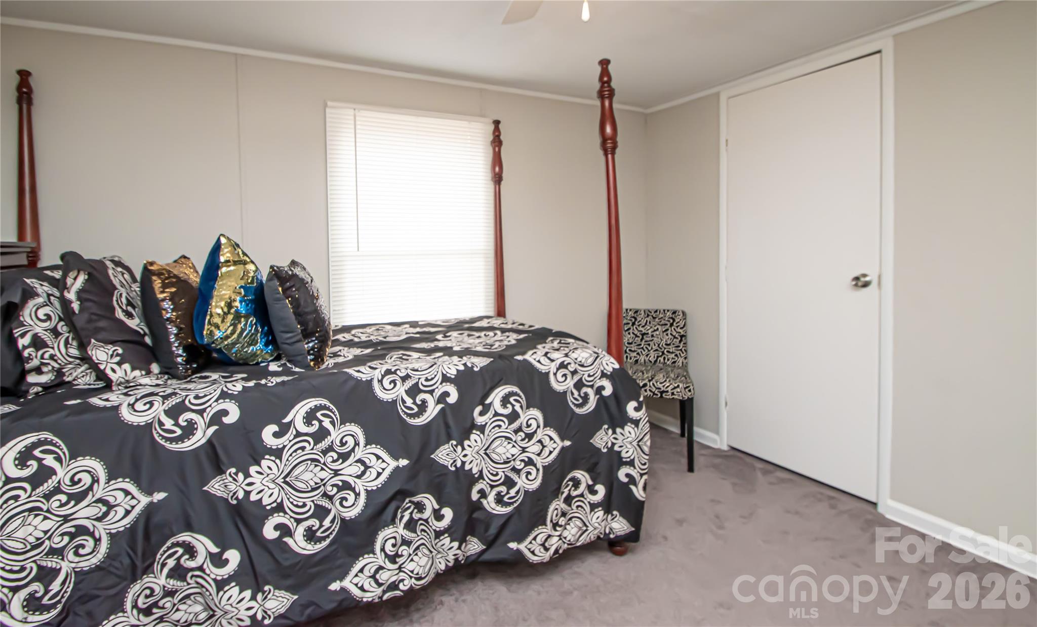 2345 Kingsburry Road York, SC 29745 - Photo 29 of 43 a bedroom with a large bed and a window