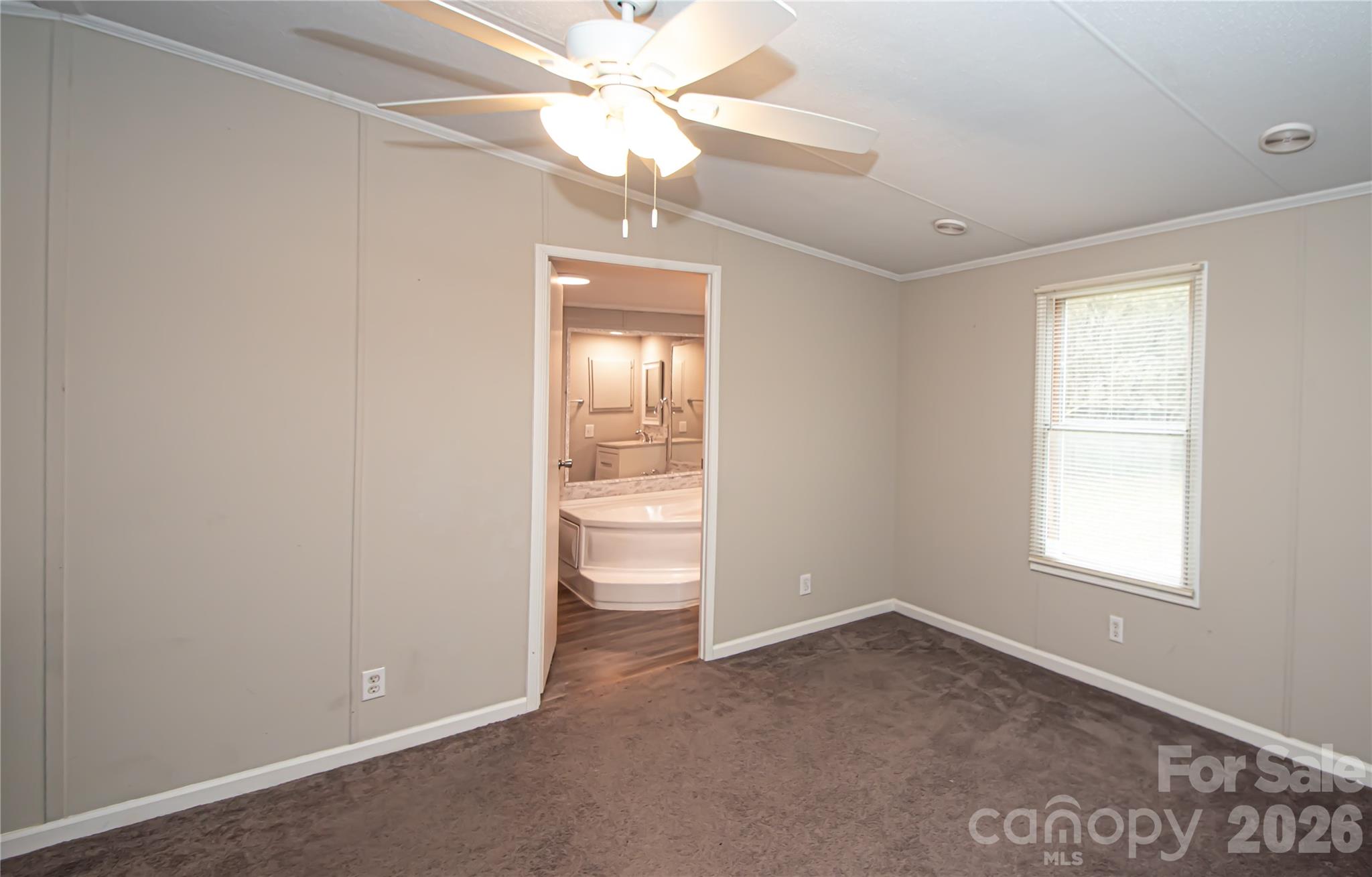 2345 Kingsburry Road York, SC 29745 - Photo 33 of 43 an empty room with a window and a fan