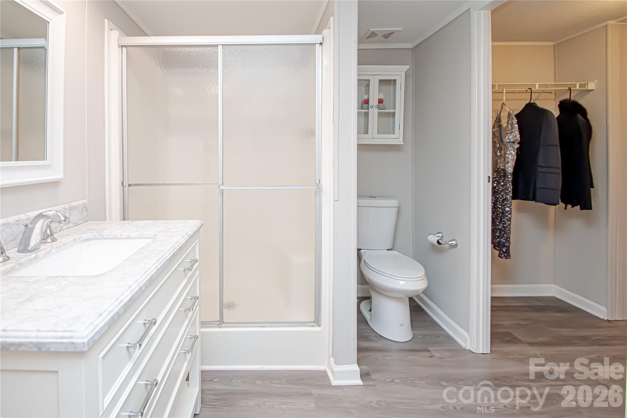 2345 Kingsburry Road York, SC 29745 - Photo 38 of 43 a bathroom with a granite countertop sink toilet and shower