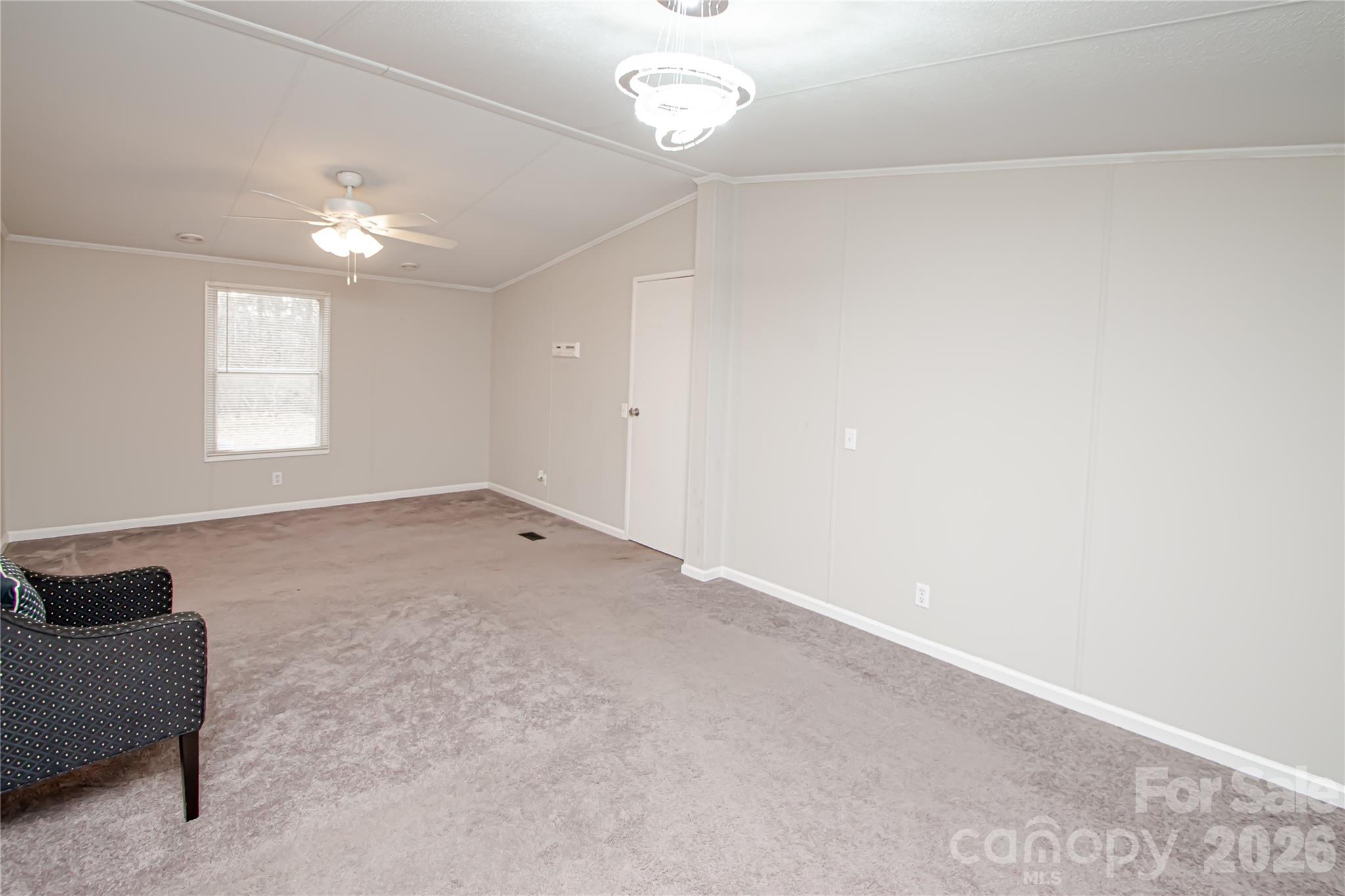 2345 Kingsburry Road York, SC 29745 - Photo 40 of 43 an empty room with windows and ceiling fan