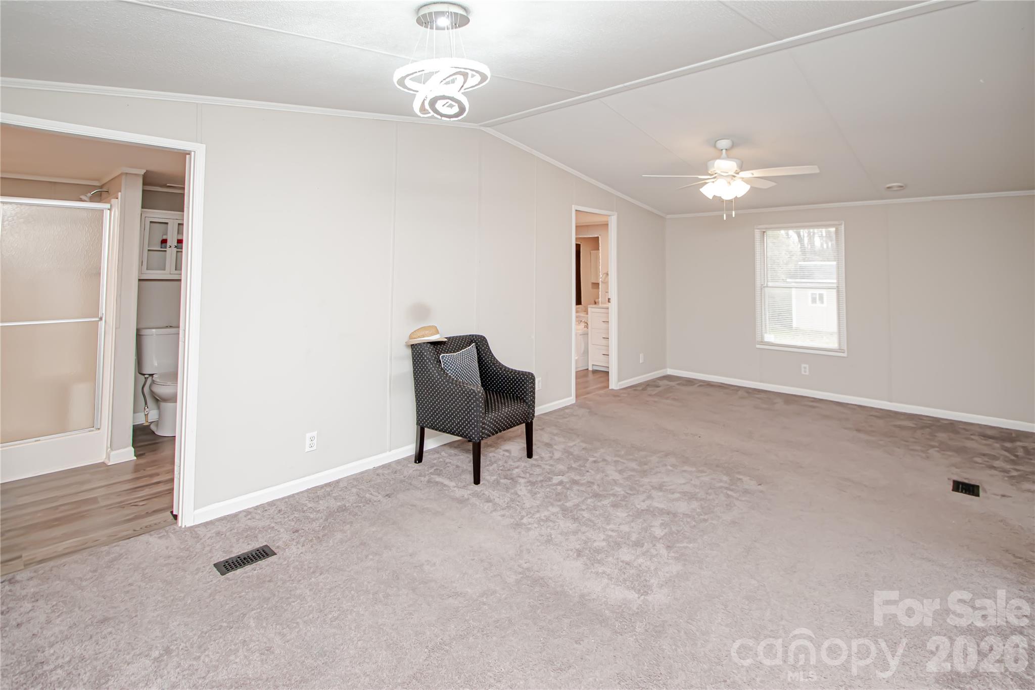 2345 Kingsburry Road York, SC 29745 - Photo 41 of 43 en empty room with windows and ceiling fan