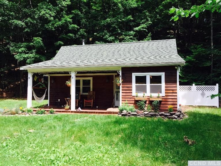 40 Bogardus Road Cairo, NY 12405 - Photo 2 of 10 a view of a house with sitting area and garden