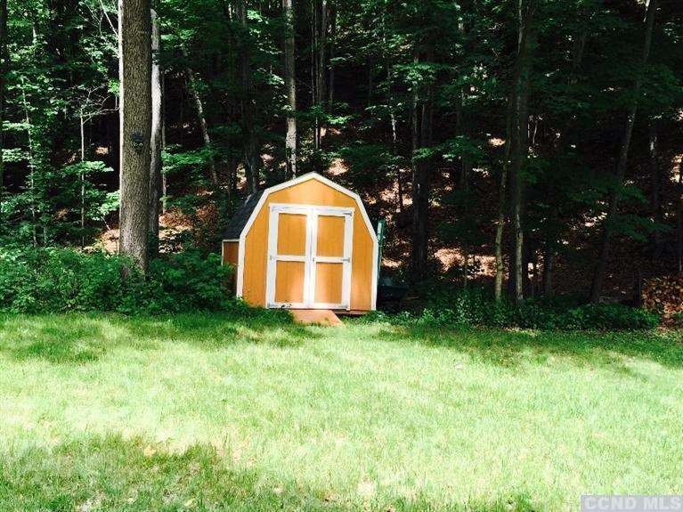 40 Bogardus Road Cairo, NY 12405 - Photo 6 of 10 a view of a garden with swimming pool and garden