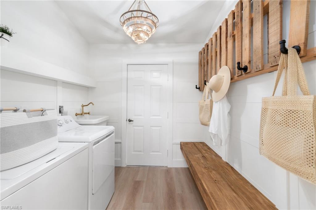 548 Ibis Way Naples, FL 34110 - Photo 31 of 45 a view of a kitchen from a hallway