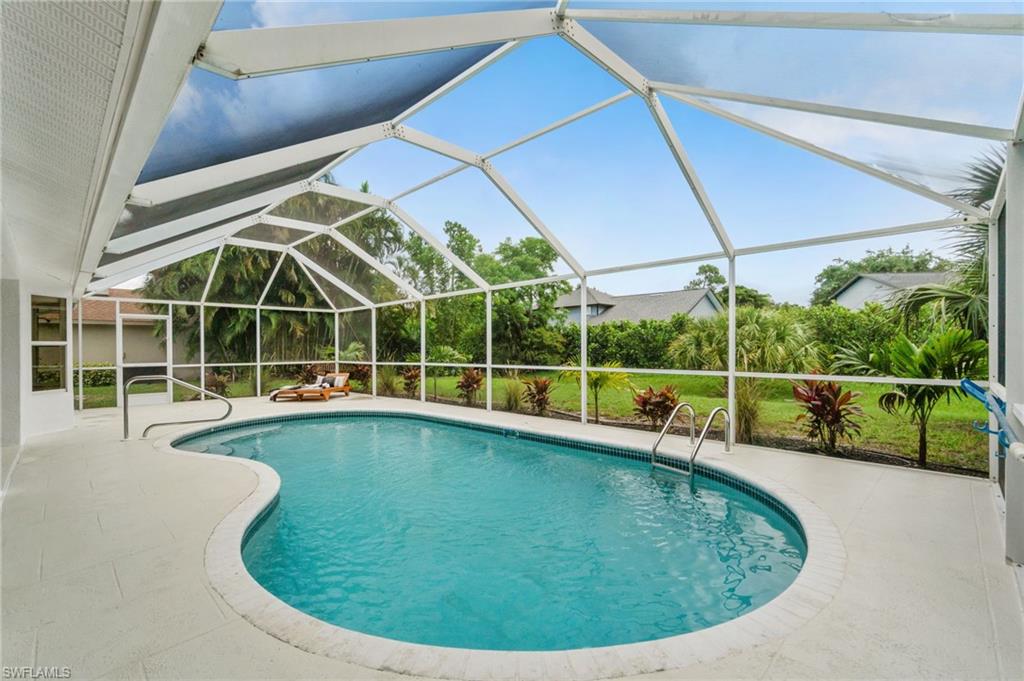548 Ibis Way Naples, FL 34110 - Photo 39 of 45 a view of outdoor space and swimming pool