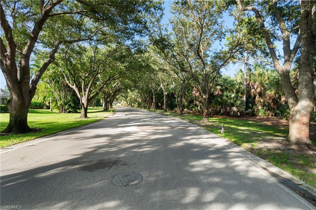 548 Ibis Way Naples, FL 34110 - Photo 44 of 45 a view of green field