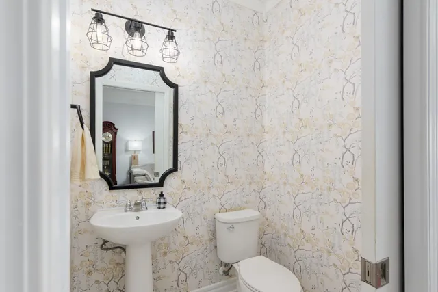 a view of a livingroom with furniture and a window