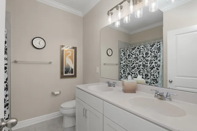 an aerial view of a house with a garden