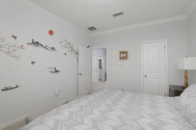 an aerial view of a house with swimming pool