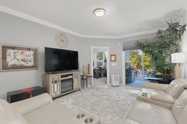 a view of a livingroom with wooden floor