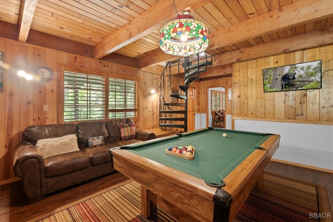 24755 Basel Drive Crestline, CA 92325 - Photo 18 of 28 a living room with furniture and a chandelier