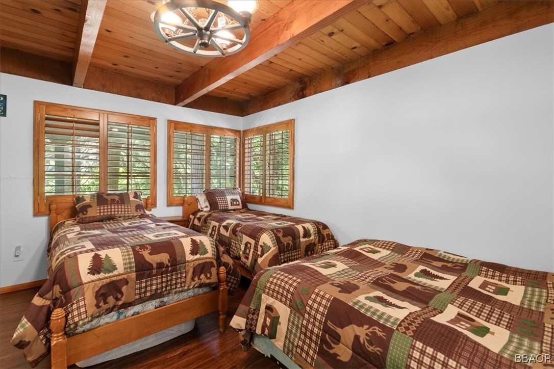 24755 Basel Drive Crestline, CA 92325 - Photo 20 of 28 a bedroom with two beds and a large window