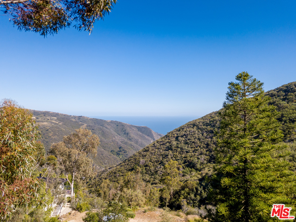 2382 Live Oak Meadows Road Malibu, CA 90265 - Photo 24 of 27 a view of a large window with an outdoor space