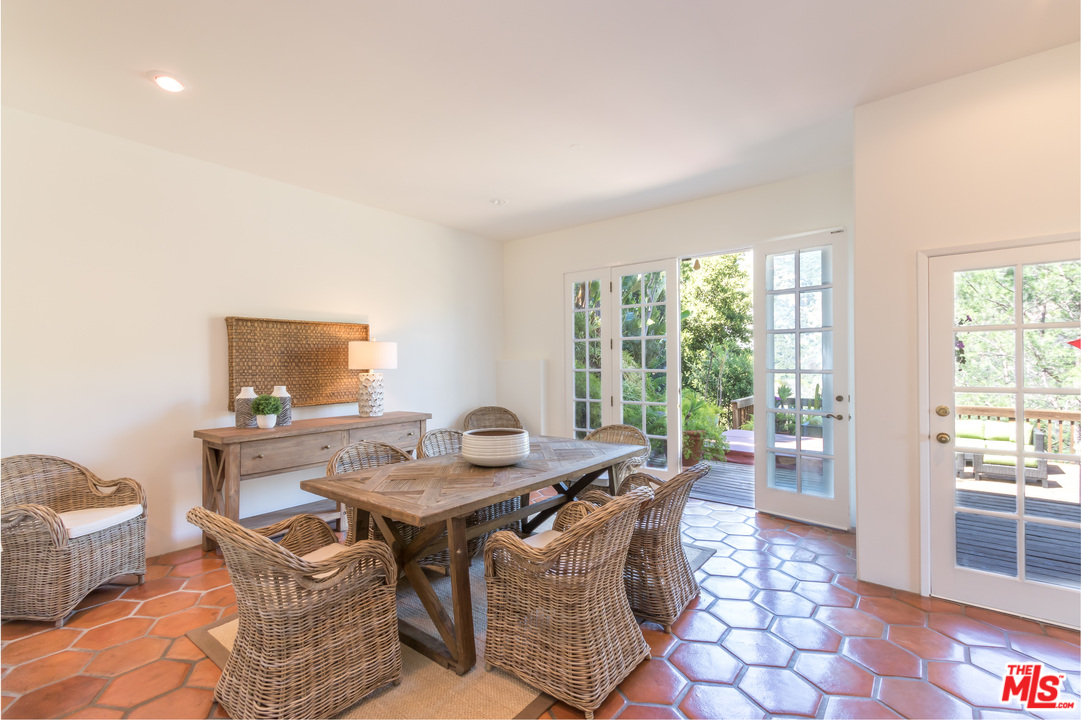 2382 Live Oak Meadows Road Malibu, CA 90265 - Photo 6 of 27 a dining room with furniture and window