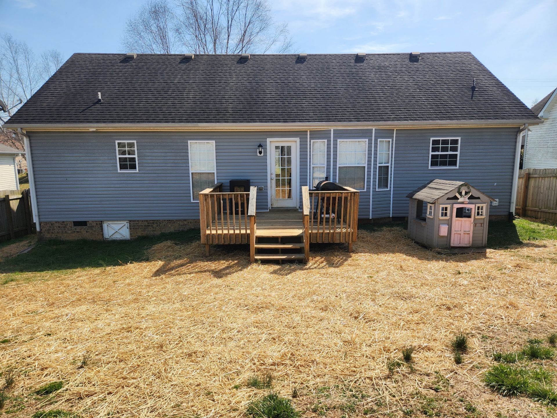419 Berry Circle Springfield, TN 37172 - Photo 18 of 19 a backyard of a house with fire pit and outdoor seating