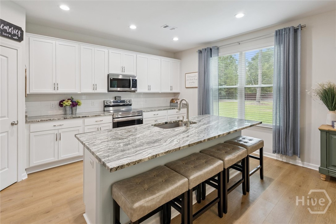 110 Ramsey Way Rincon, GA 31326 - Photo 17 of 51 Granite CounterTops