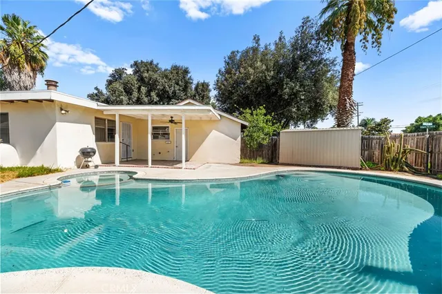 a view of a house with a swimming pool