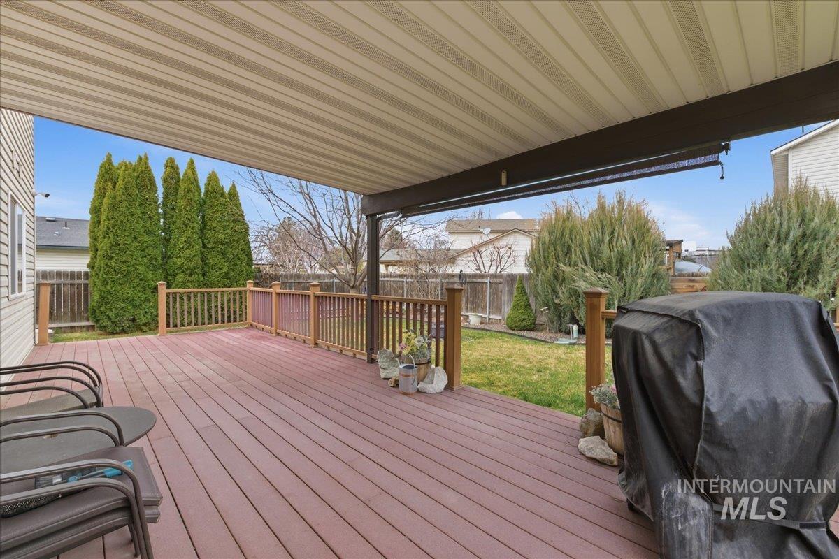 1896 West Ridge Pointe Avenue Nampa, ID 83651 - Photo 30 of 49 Deck featuring grilling area and a fenced backyard