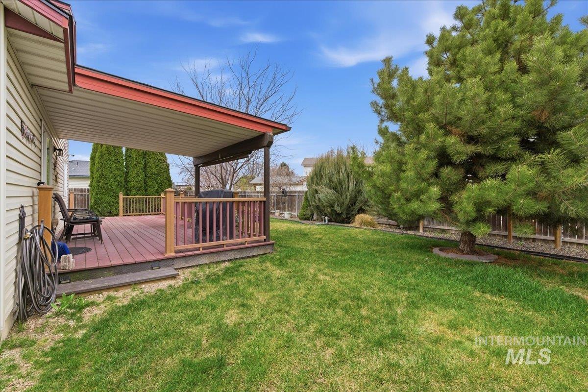 1896 West Ridge Pointe Avenue Nampa, ID 83651 - Photo 41 of 49 Fenced backyard with a deck