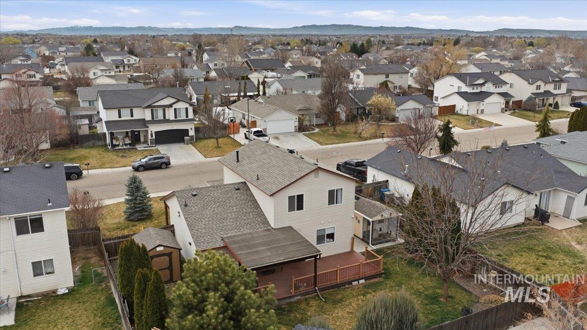 1896 West Ridge Pointe Avenue Nampa, ID 83651 - Photo 45 of 49 Aerial view of residential area with a mountainous background