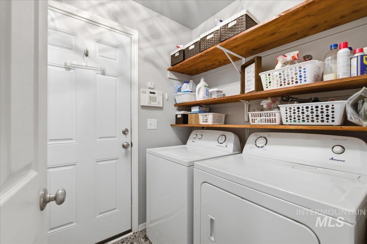 1896 West Ridge Pointe Avenue Nampa, ID 83651 - Photo 10 of 49 Laundry area featuring separate washer and dryer