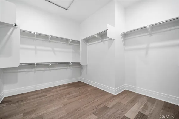 a view of an empty walk in closet