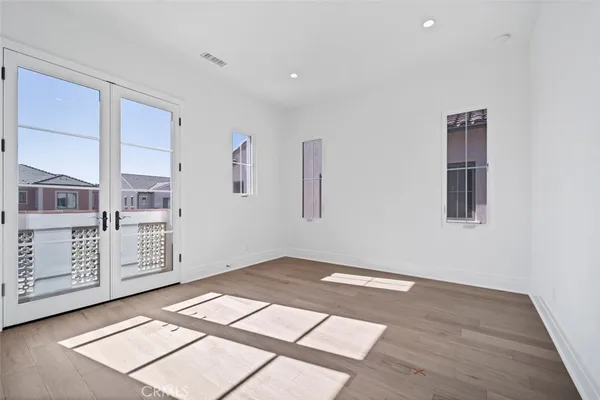 an empty room with windows