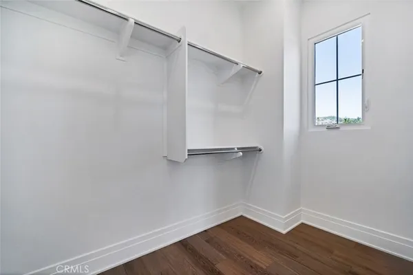 a view of an empty walk in closet