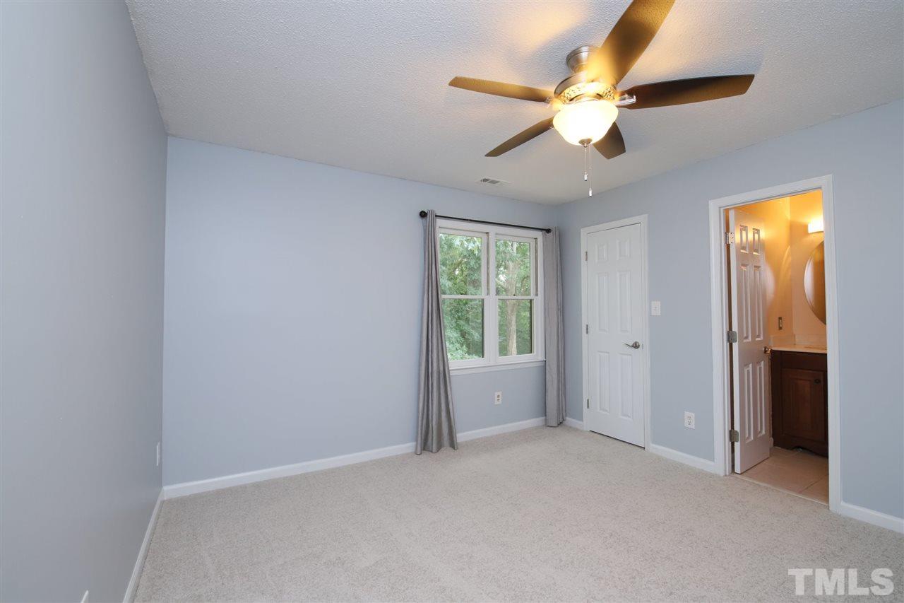 6708 Chauncey Drive Raleigh, NC 27615 - Photo 13 of 25 a view of an empty room with a window