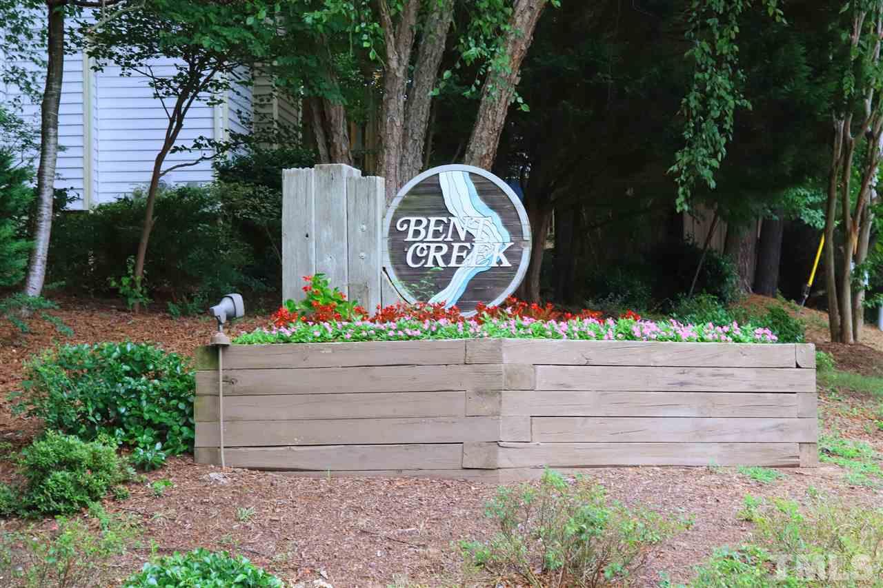 6708 Chauncey Drive Raleigh, NC 27615 - Photo 24 of 25 a wooden fence with some plants