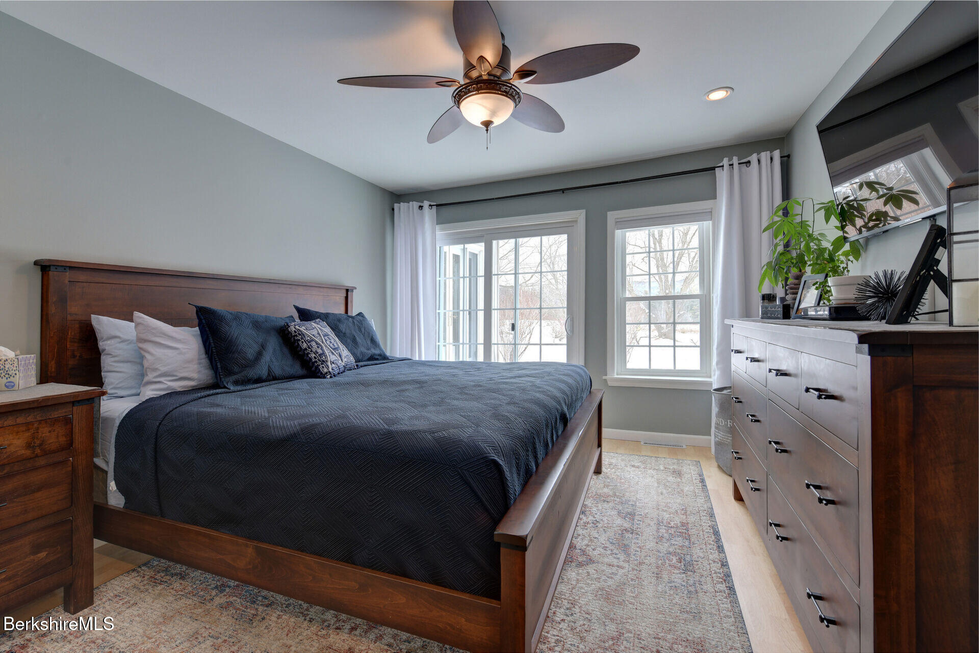 43 Chapman Road Pittsfield, MA 01201 - Photo 17 of 26 a bedroom with a bed and a dresser