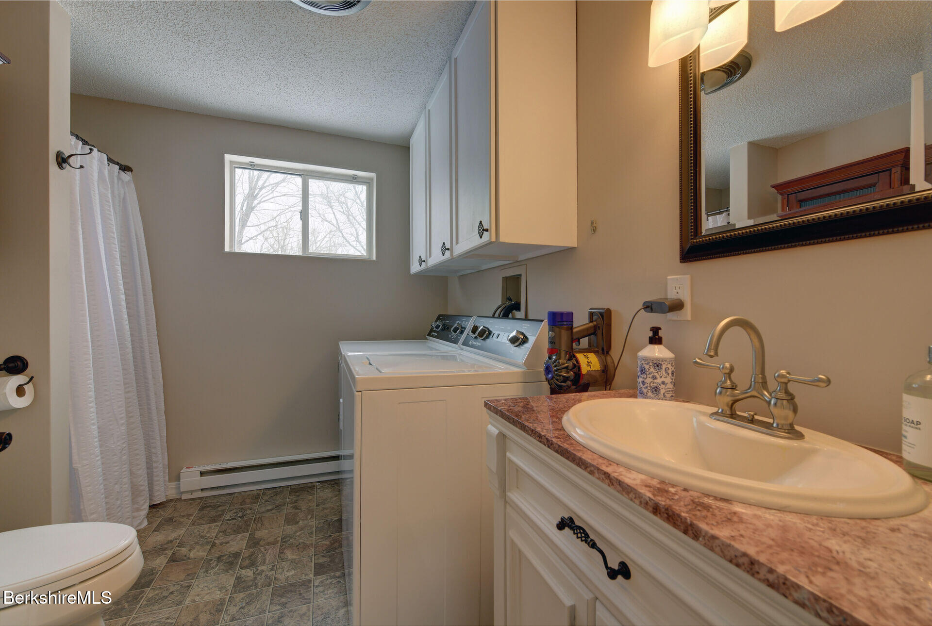 43 Chapman Road Pittsfield, MA 01201 - Photo 19 of 26 a bathroom with a sink and a toilet