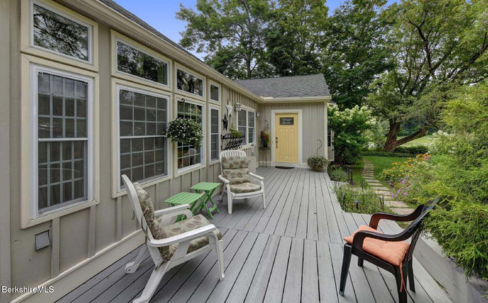 43 Chapman Road Pittsfield, MA 01201 - Photo 2 of 26 a view of a chair and table in the balcony