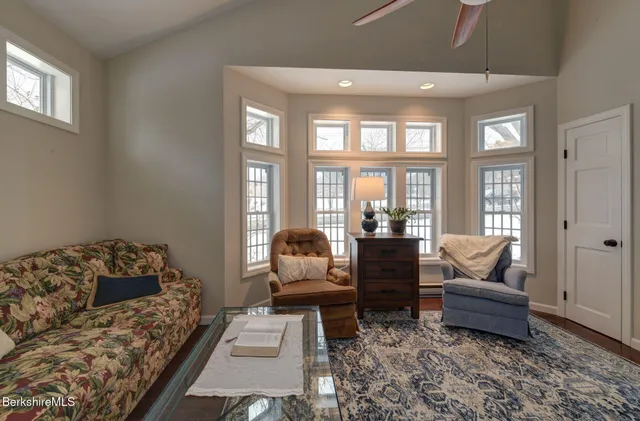 a living room with furniture and a couch