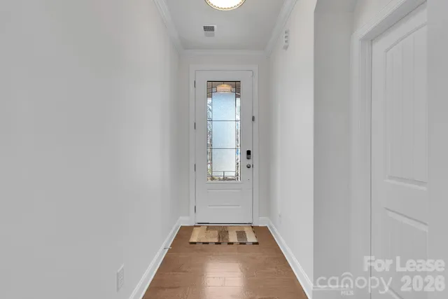 a view of dining room with furniture and wooden floor