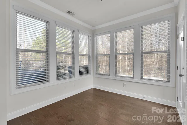 a kitchen with kitchen island a refrigerator stove and microwave