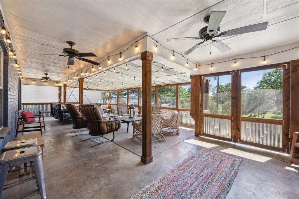 2859 Rodeo Drive Quinlan, TX 75474 - Photo 24 of 35 This screened porch is divine!