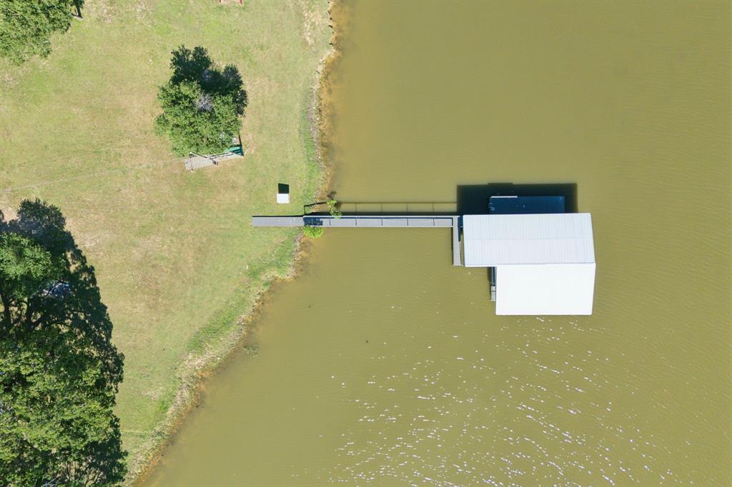 2859 Rodeo Drive Quinlan, TX 75474 - Photo 28 of 35 Boat dock for 2 boats and 2 jet skis.