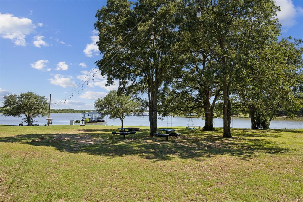 2859 Rodeo Drive Quinlan, TX 75474 - Photo 32 of 35 Zipline your way from the house to the boat dock. Or, take on the ninja course challenge.