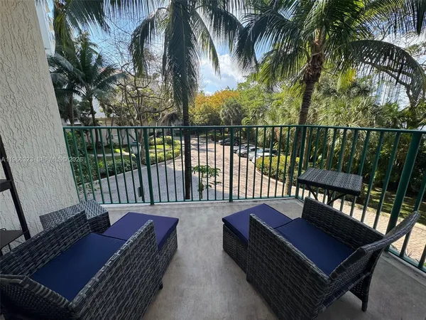 a view of a roof deck with couches