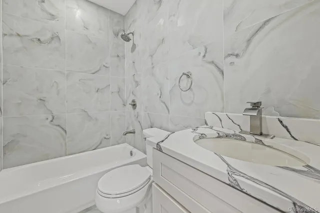 $989,000 | 95-22 75th Street | Ozone Park